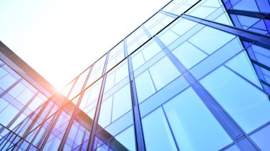Cam cepheli modern ofis binası. Ofis binasının şeffaf cam duvarı. Binanın ön cephesinde mavi gökyüzünün yansıması.