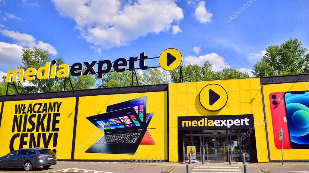 Warsaw, Poland. 28 April 2024. Media Expert shop with logo sign. Polish chain of supermarkets with electronics, appliances, computers, software and multimedia. Electromarket store signboard.