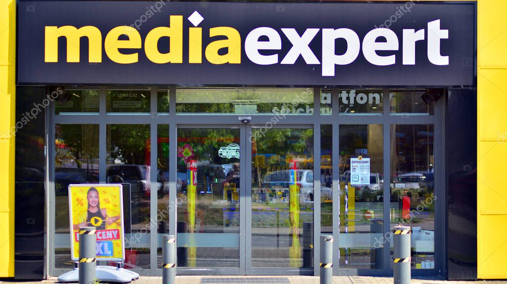 Warsaw, Poland. 28 April 2024. Media Expert shop with logo sign. Polish chain of supermarkets with electronics, appliances, computers, software and multimedia. Electromarket store signboard.