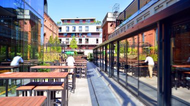 Warsaw, Poland. 9 July 2024. View of building of the Elektrownia Powisle. A revitalized former factory building. The history of the Powisle Power Plant is over 100 years old. clipart