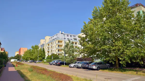 Stock image Warsaw, Poland. 24 August 2024. Ursynow district intensive residential developments in this modern residential buildings and wide streets with pedestrian and car traffic near Las Kabacki Forest.