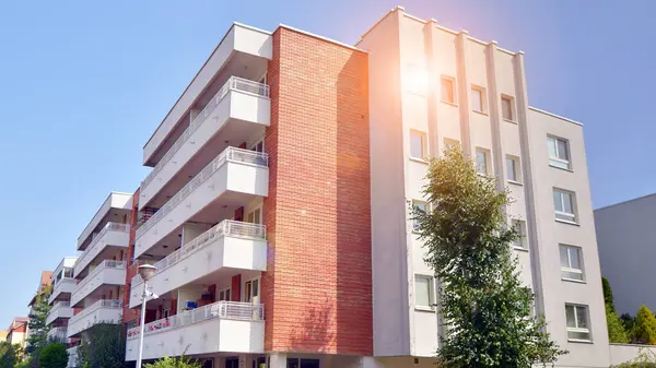 stock image Low angle view apartment building  from the beginning of the 21st century. Architectural elements of apartment building. Green surroundings of buildings. Ecological housing estate.