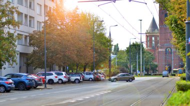 Warsaw, Poland. 25 August 2024. Cars parked neatly inside an street in Ochota district. clipart