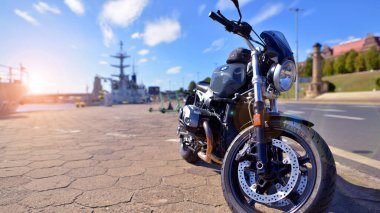 Szczecin, Poland. 14 September 2024. A BMW R 12 nine T motorcycle stands on the river bank clipart