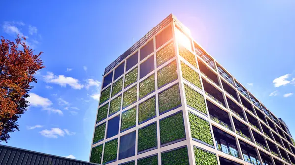 Ağaçlı modern şehir ekonomi bürosu binası. Modern mimari cephesinin detaylı görüntüleri, iş kavramları. Çevre. Modern bina ve ağaçlar, çift pozlama.