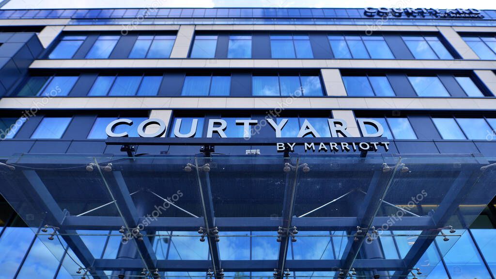 Szczecin, Poland. 16 July 2025. Urban landscape. Neon sign with the inscription: Courtyard by Marriott.