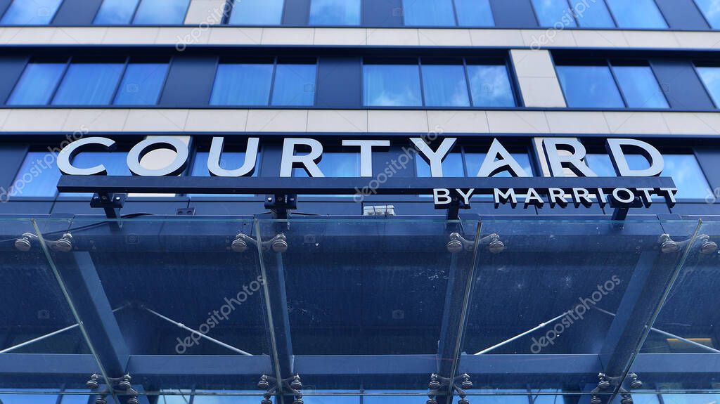 Szczecin, Poland. 16 July 2025. Urban landscape. Neon sign with the inscription: Courtyard by Marriott.