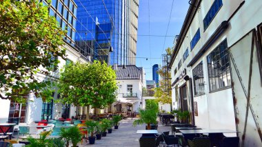 Warsaw, Poland. 21 September 2025. New business and financial district Wola with Fabryka Norblina office centrum. It is a new part of the city with offices, shops, restaurants and cafes.