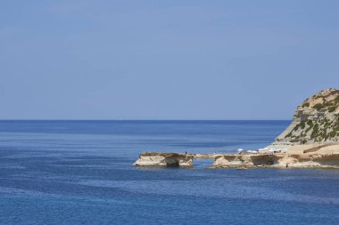 Marsalforn, Gozo, Malta - June 9, 2023: Scenic bay of the coastal resort of Marsalforn on the island of Gozo in Malta