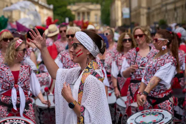 stock image Bath, England, United Kingdom - 13 July 2024: Drumming band performing at the annual carnival as it progresses through the streets of the historic city of Bath in Somerset.