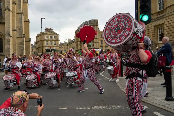 stock image Bath, England, United Kingdom - 13 July 2024: Drumming band performing at the annual carnival as it progresses through the streets of the historic city of Bath in Somerset.