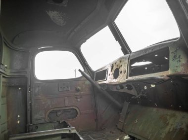Abandoned rusty salon of an old WWII military truck.