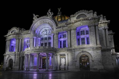 A mesmerizing nighttime view of the Palacio de Bellas Artes in Mexico City, with its iconic architecture beautifully illuminated clipart