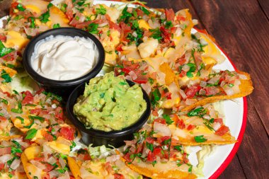 Loaded Nachos with Guacamole clipart