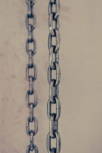 Two Iron Chains Hang Vertically Light Background Iron Traction Structure — Stock Photo, Image
