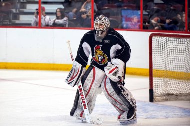 Ottawa, Canada - January 13, 2013:  Robin Lehner resumes duties during training camp of Ottawa Senators after the NHL lockout ends.  The season will resume with a 48 game schedule. clipart