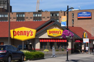 Niagara Falls, Canada  August 13, 2022 Denny's Diner and Howard Johnson Hotel on Victoria Avenue in the popular tourist destination of Niagara Falls.