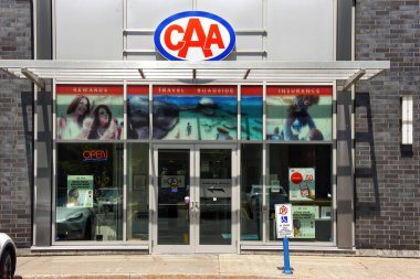 Ottawa, Canada The Canadian Automobile Association (CAA).  The clubs provide roadside assistance, auto touring and leisure travel services, insurance services, and member discount programs clipart