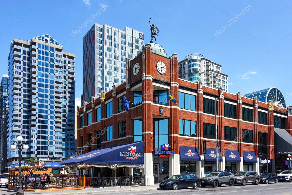Ottawa, Canada - June 14, 2025: Buildings in the Byward Market in Ottawa, including The Lone Star Texas Grill, condos and the newly opened AC Hotel.