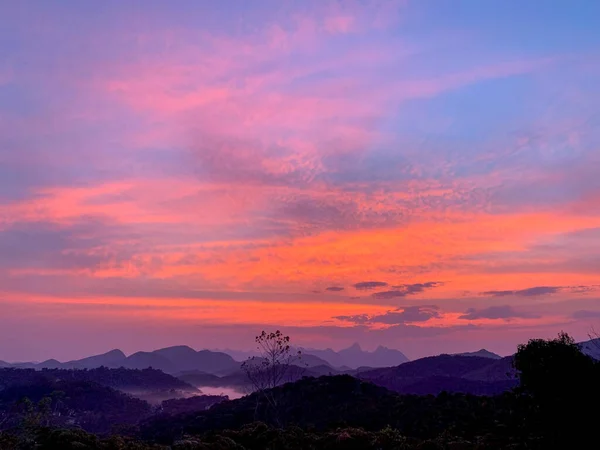 Stock image Sun rising on the mountains in the countryside.