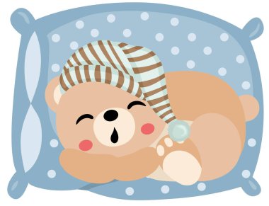 Sevimli oyuncak ayı yastıkta uyuyor.