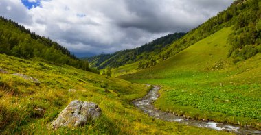 river rushing through the mountain valley, natural travel landscape