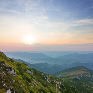 mountain valley in blue mist at the early morning, summer moutain travel background