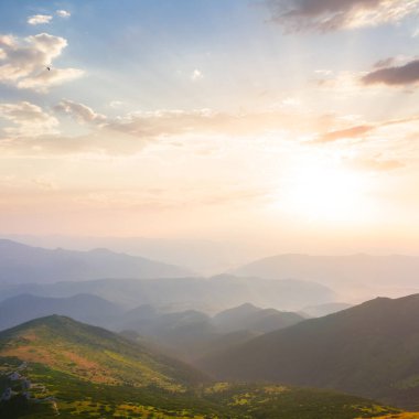 mountain valley in blue mist at the early morning, summer moutain travel background
