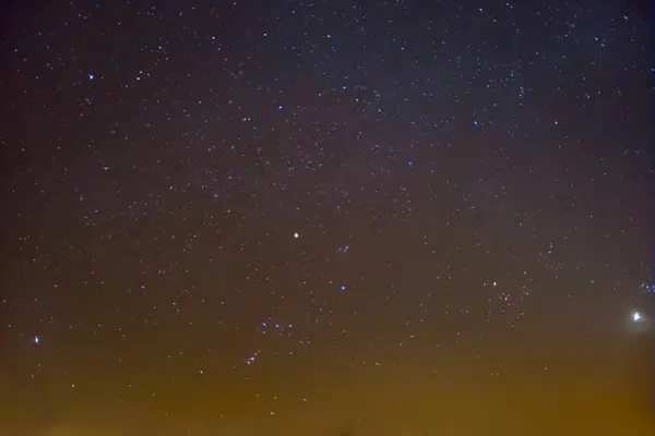 closeup Orion constellation  on night starry sky