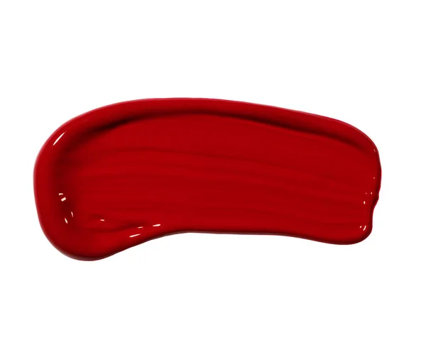 Beyaz arka planda kırmızı boya lekesi, kırmızı ruj lekesi, parlak renkli kozmetik ürün vuruşu, akryl guaj yağı boya dokusu, kozmetik ürün dokusu veya güzellik ürünü dokusu.