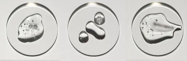 Şeffaf serum, kozmetik dokular, cilt ürünü lekesi yüz serumu, yağ, temizleyici.