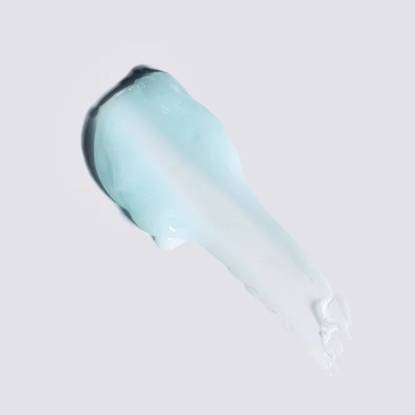 Beyaz üzerine mavi sürme kremi, kozmetik dokular