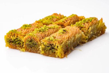 Delicious Turkish dessert pistachio kadayif. Burma kadayf clipart
