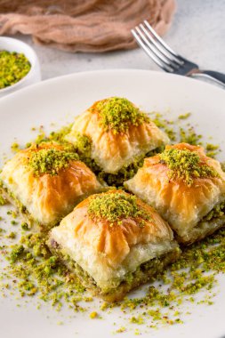 Traditional Turkish dessert baklava with pistachios clipart