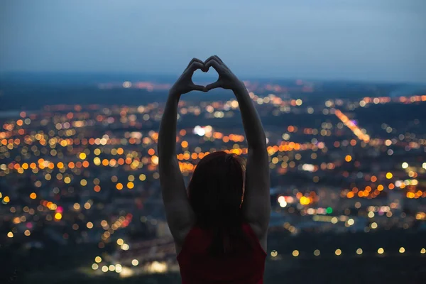 Girl Shows Her Heart Her Hands Background Lights Evening City — Stock Photo, Image