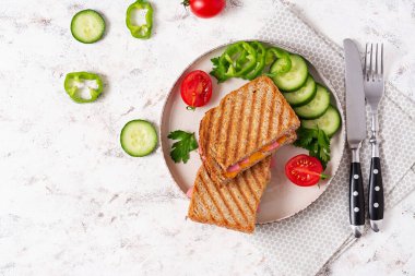 Club sandwich panini with ham and cheese. Top view