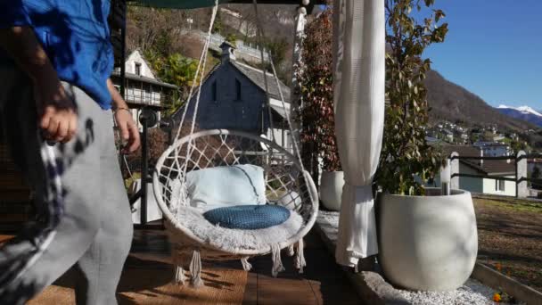 Mature Man Sitting Swing Chair — Vídeo de Stock