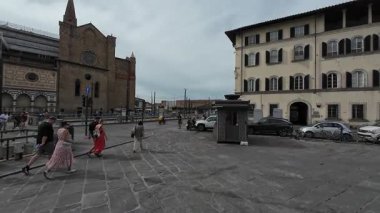 FLORENCE, ITALY - SEPTEMBER 8, 2025: people in front of the Santa Maria Novella church