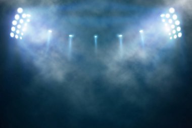 Bright stadium arena lights and smoke