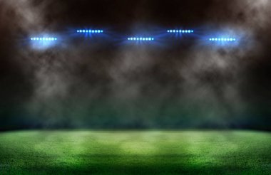 Yeşil futbol sahası, parlak spot ışıkları,