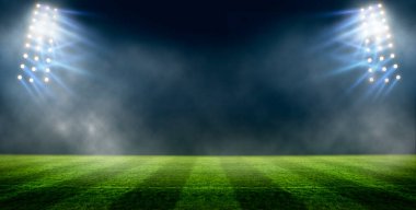 Gece ışıklar ve stadyumun renkli fenerleri. Modern renklerde kopyalama alanı olan bir el ilanı. Spor anlayışı,