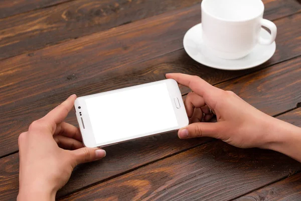 Geschäftsfrau Hält Ein Telefon Mit Isoliertem Bildschirm Vor Dem Hintergrund lizenzfreie Stockbilder