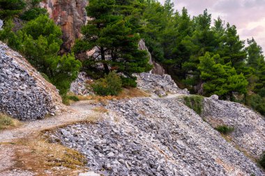 Part of an abandoned Penteli marble quarry in Attika, Greece. Penteli is a mountain, 18 km north of Athens, from which stone was supplied for the construction of the Parthenon.