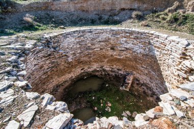 Mycenaean tholos tomb at Thorikos, Attica, Greece. The Mycenaean graves at Thorikos illustrate perfectly the evolution of tomb types.