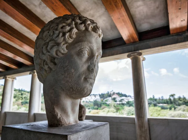 stock image Ancient sculpture displayed at the Stoa of Attalos, Athens, Greece. Stoa was built in 150 BC and rebuilt in the early 1950s.