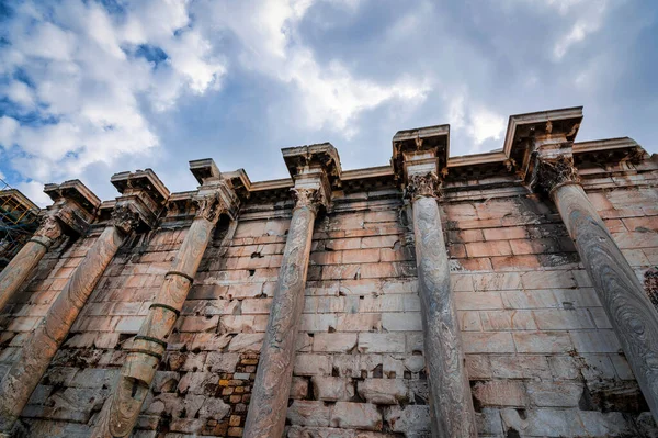 Hadrian\'s Library wall and columns. Ancient Greek colonnade architecture details in Athens, Greece.