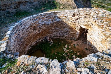 Mycenaean tholos tomb at Thorikos, Attica, Greece. The Mycenaean graves at Thorikos illustrate perfectly the evolution of tomb types.