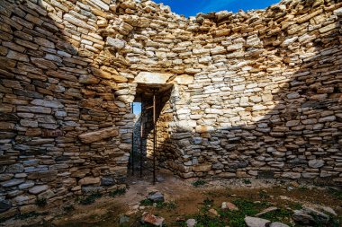 Mycenaean tholos tomb at Thorikos, Attica, Greece. The Mycenaean graves at Thorikos illustrate perfectly the evolution of tomb types.