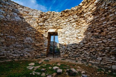 Mycenaean tholos tomb at Thorikos, Attica, Greece. The Mycenaean graves at Thorikos illustrate perfectly the evolution of tomb types.