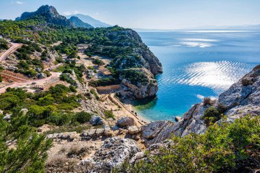 Yunanistan 'ın Loutraki kentindeki Vouliagmenis Gölü yakınlarındaki Heraion ikonik arkeolojik sahasından görüntüler.